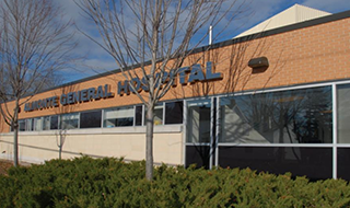 Exterior view of Almonte General Hospital building with name in large letters photo